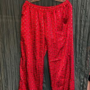 Red pattern silkie pajama bottoms.